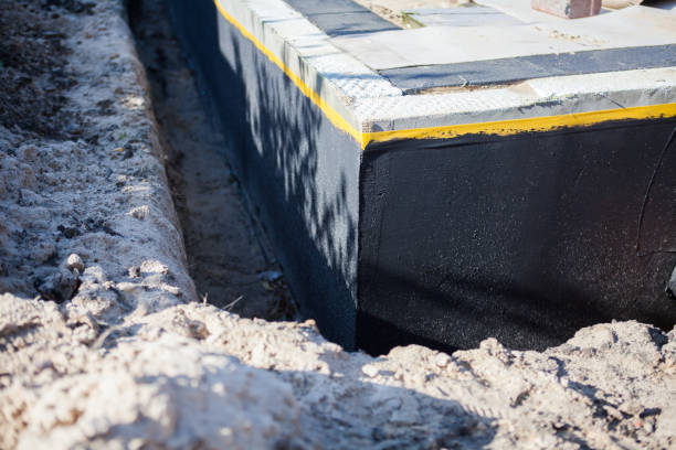 Professional Waterproofing technician working in Red Bank, NJ
